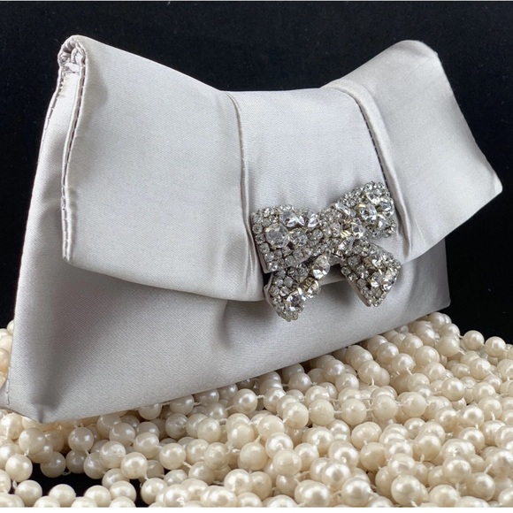 Betsey Johnson Handbags - Betsey Johnson Silver Clutch with Rhinestone Bow Gray/Silver Satin with crystals